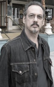 Wayne Barlowe outside in a black denim shirt
